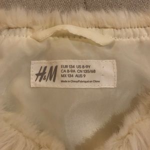 Ivory faux fur vest